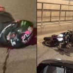 道路を走るバイカー、愚かな中国人女ドライバーの運転で逝く